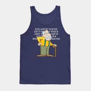 You know you're getting old when just sitting up in your chair is a multi-step process. Tank Top